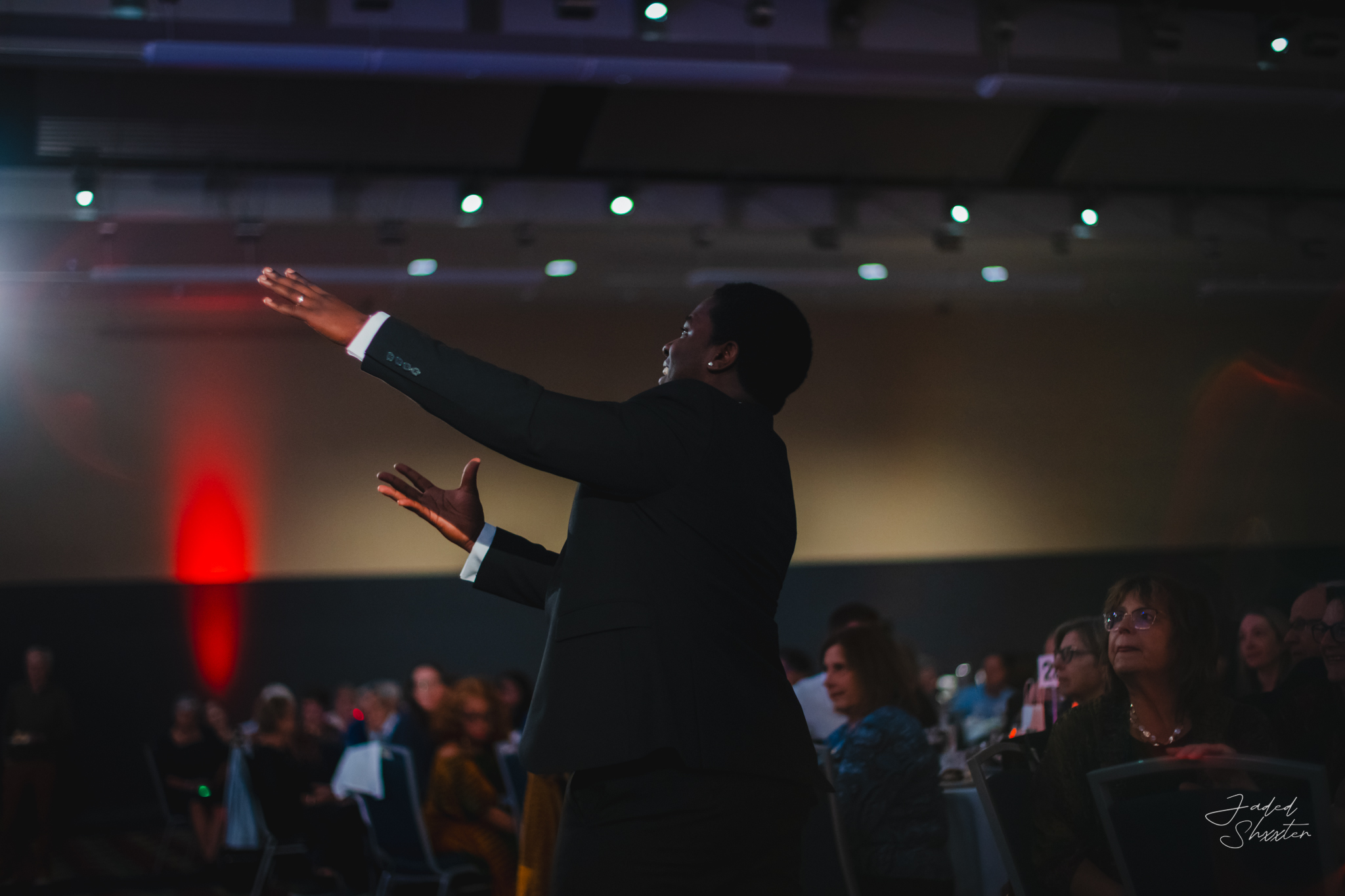 Christian George conducting a live performance